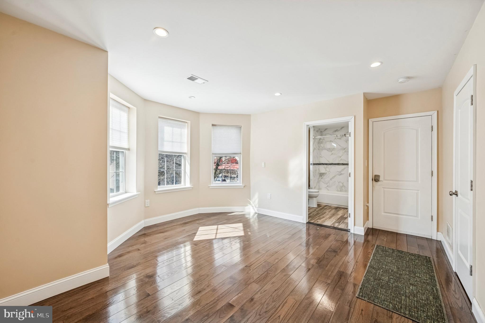 3730 Spring Garden Street Philadelphia, PA 19104 - Photo 11 of 24 wooden floor in an empty room with a window