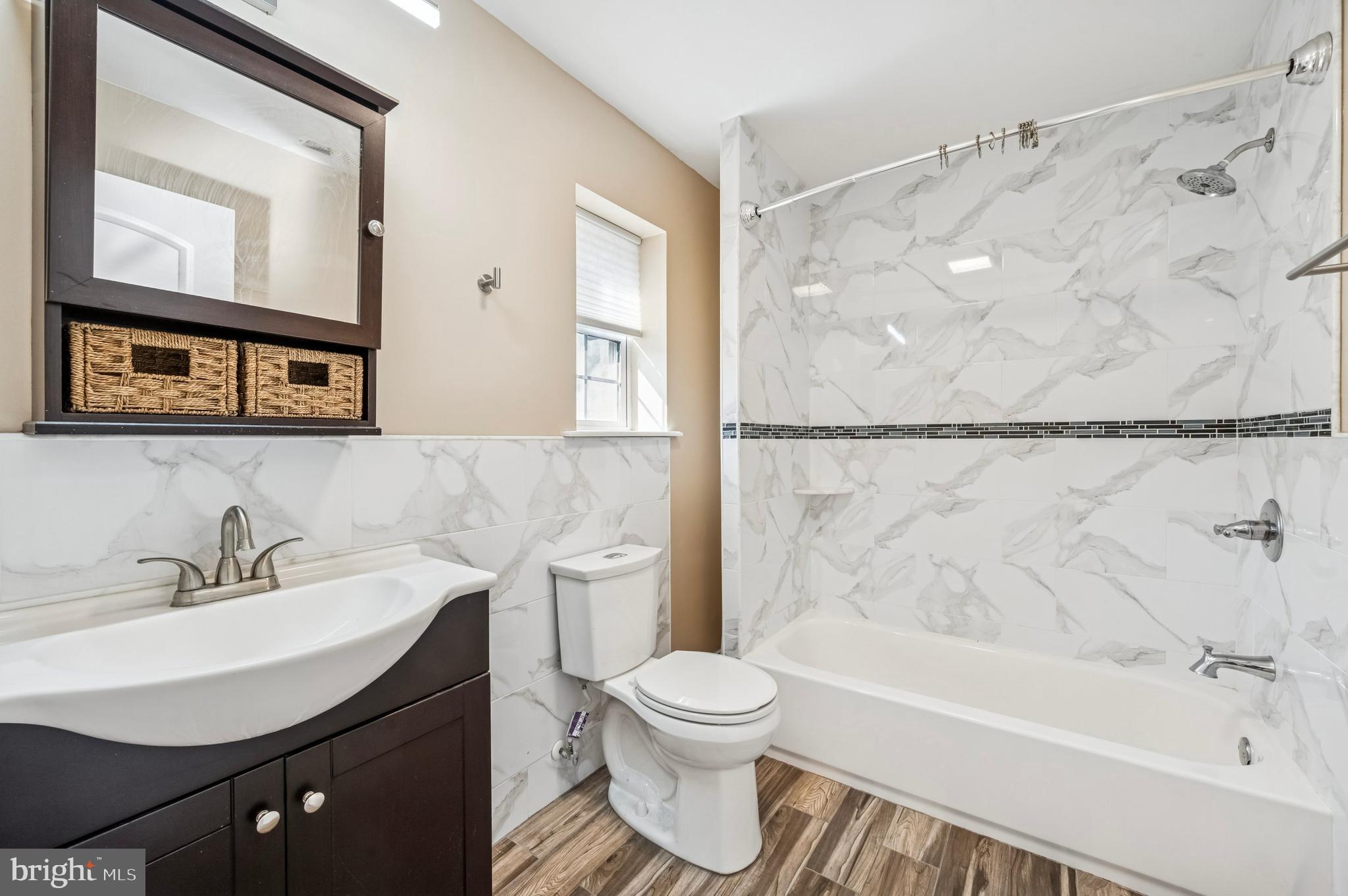 3730 Spring Garden Street Philadelphia, PA 19104 - Photo 16 of 24 a bathroom with a sink toilet and shower