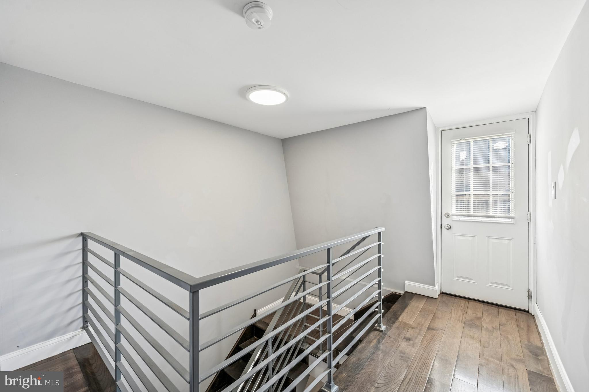 3730 Spring Garden Street Philadelphia, PA 19104 - Photo 24 of 24 a view of a room with wooden floor and white walls