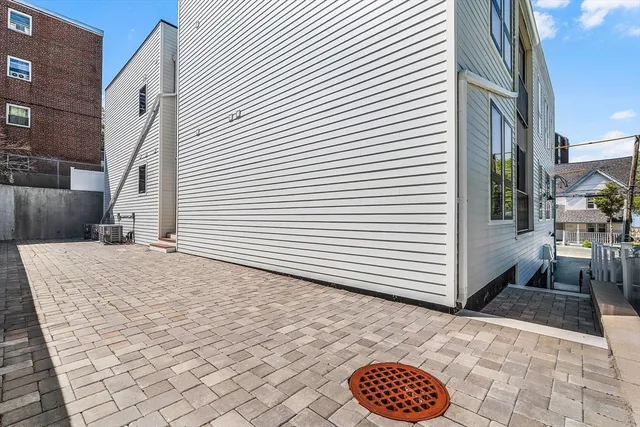 a view of a bedroom with a balcony