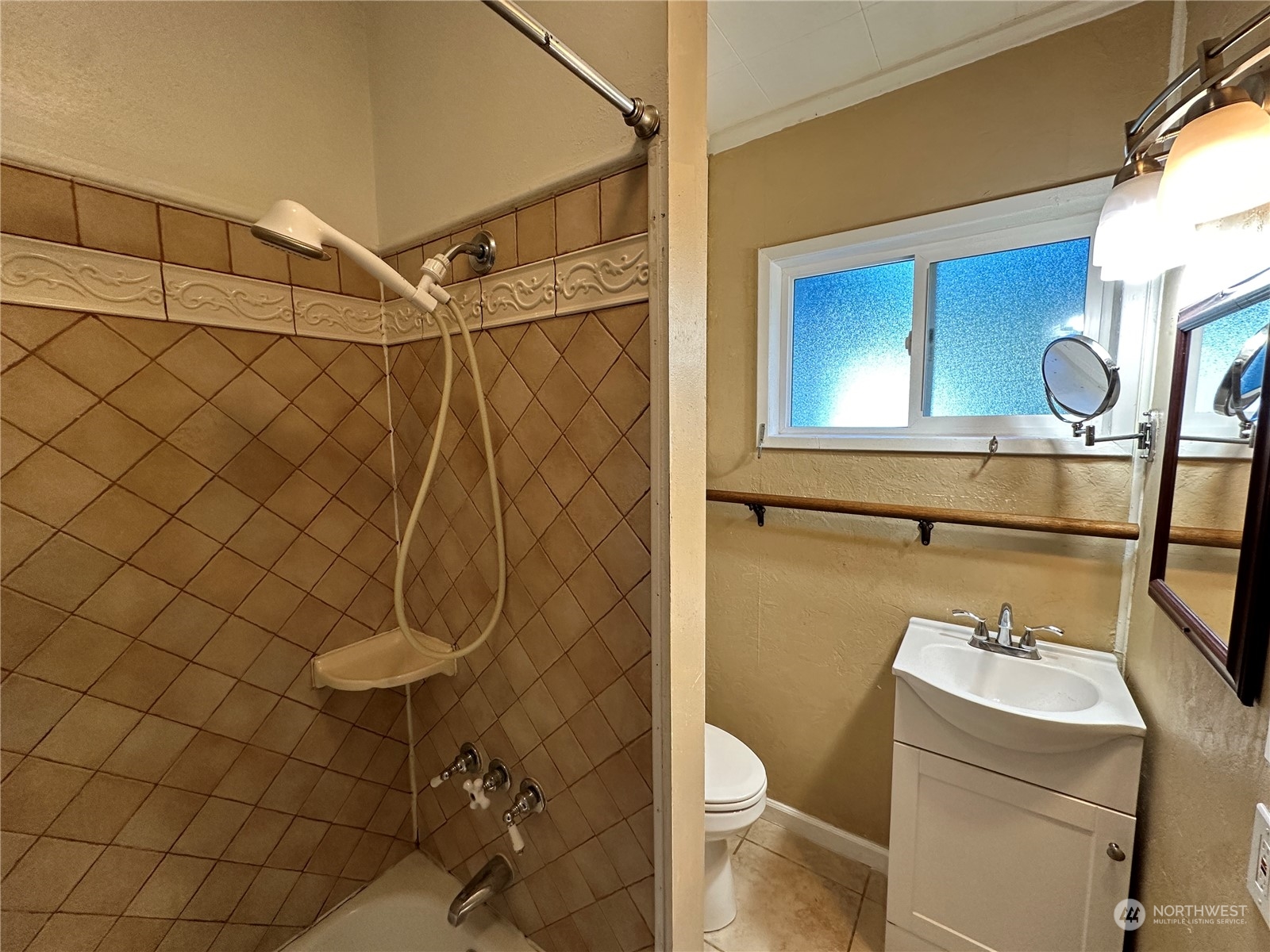 51 East Runnion Road Sequim, WA 98382 - Photo 12 of 40 a bathroom with a shower a toilet and a shower