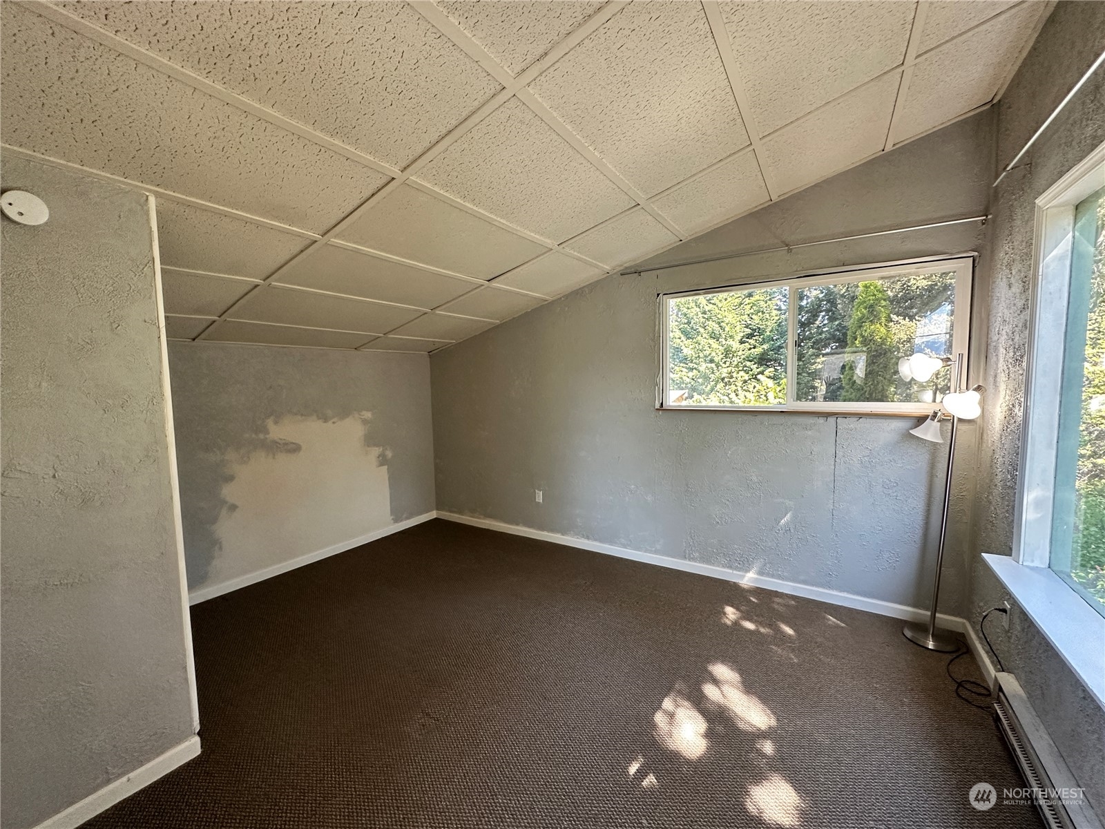 51 East Runnion Road Sequim, WA 98382 - Photo 15 of 40 an empty room with windows