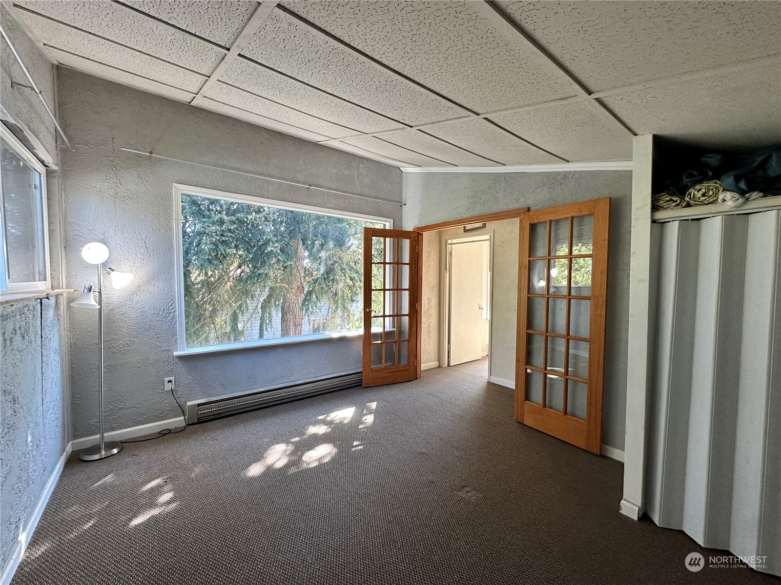 51 East Runnion Road Sequim, WA 98382 - Photo 16 of 40 a view of empty room with floor to ceiling window