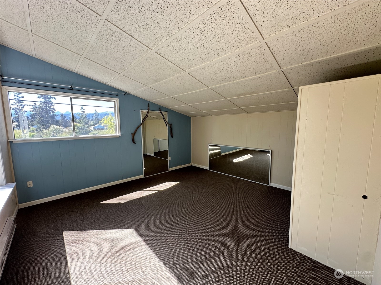 51 East Runnion Road Sequim, WA 98382 - Photo 17 of 40 a view of a livingroom with furniture and window