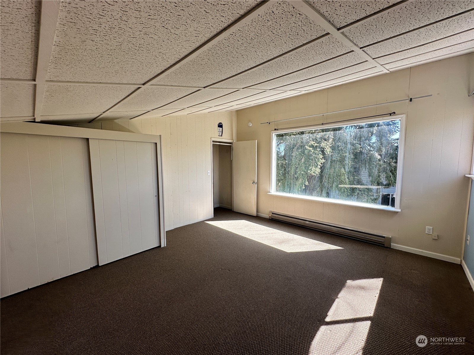 51 East Runnion Road Sequim, WA 98382 - Photo 18 of 40 a view of an empty room with a window
