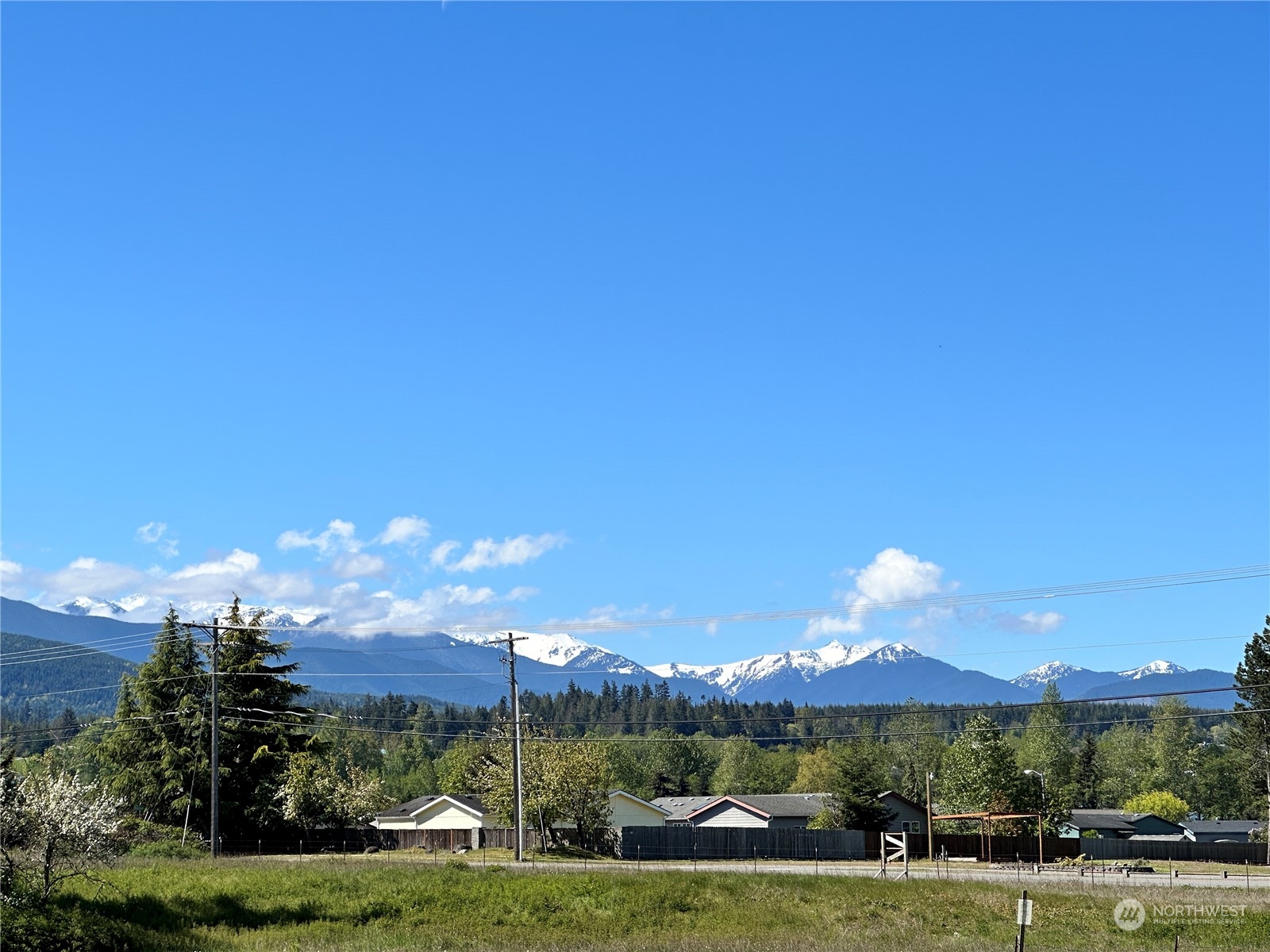 51 East Runnion Road Sequim, WA 98382 - Photo 2 of 40 a view of a city with tall buildings