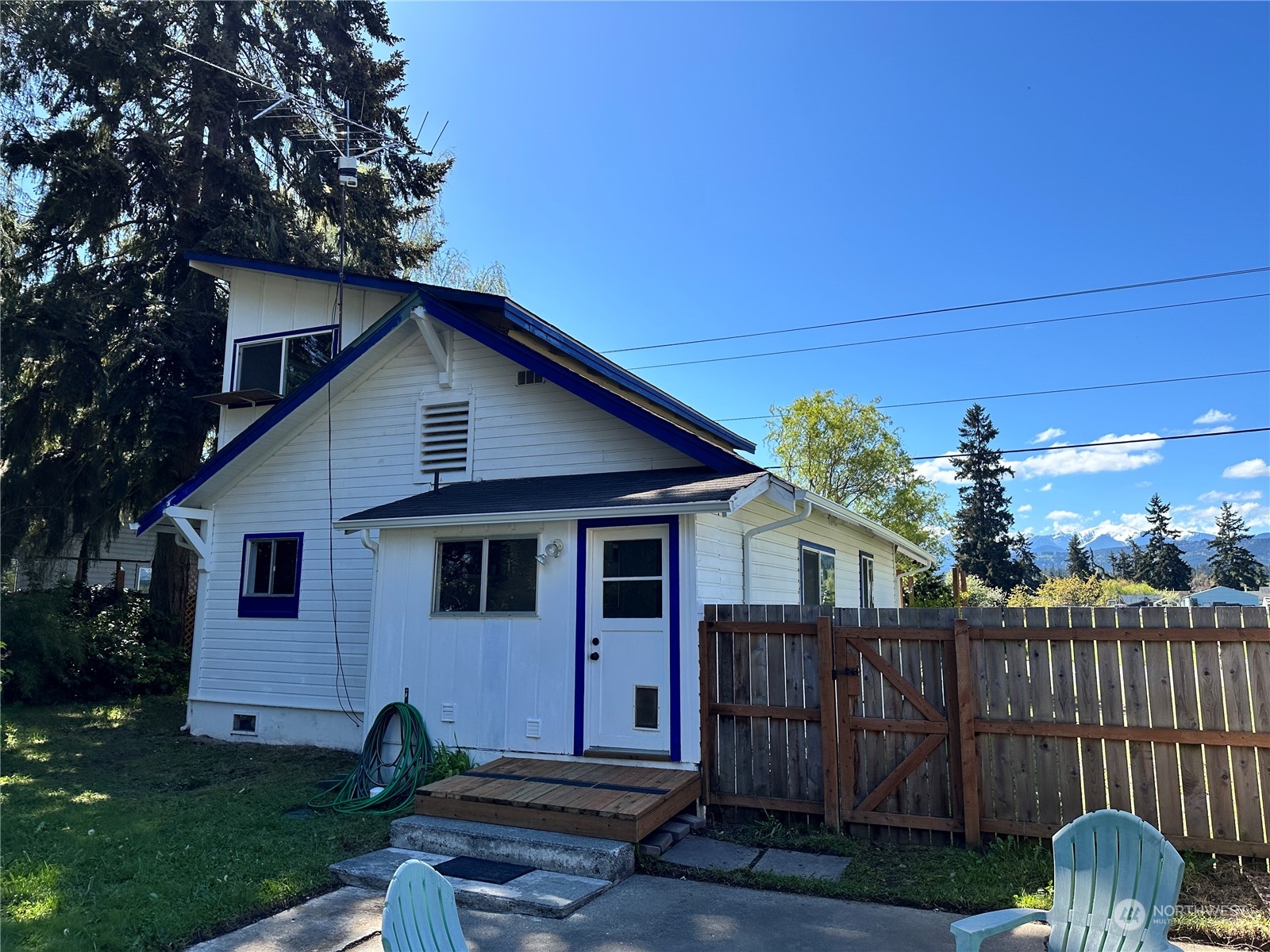 51 East Runnion Road Sequim, WA 98382 - Photo 26 of 40 a front view of a house with garden