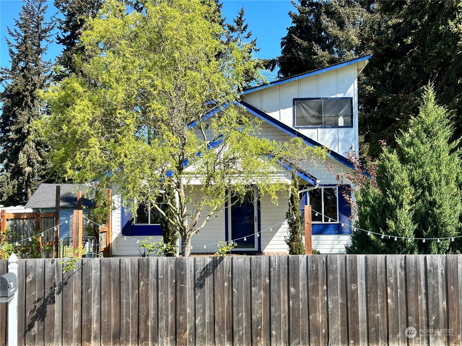 51 East Runnion Road Sequim, WA 98382 - Photo 3 of 40 a front view of house with wooden fence