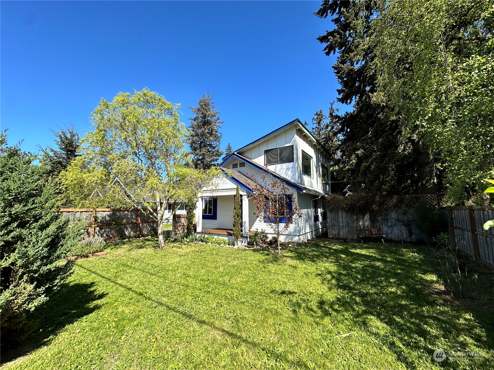 51 East Runnion Road Sequim, WA 98382 - Photo 31 of 40 a front view of a house with garden
