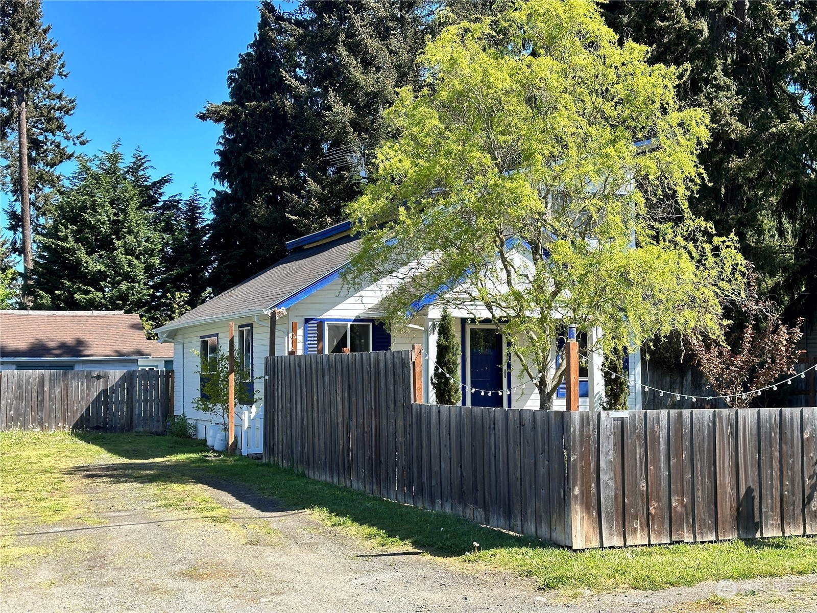 51 East Runnion Road Sequim, WA 98382 - Photo 32 of 40 a view of a house with a yard
