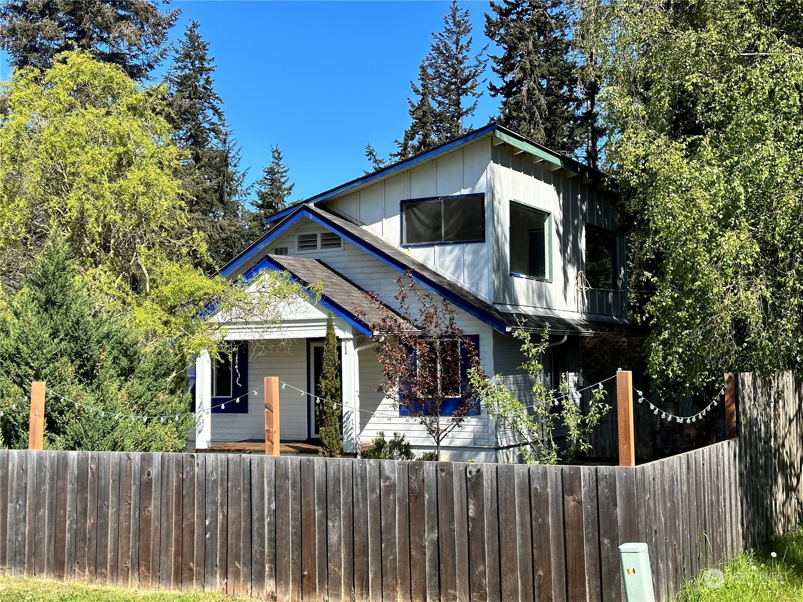 51 East Runnion Road Sequim, WA 98382 - Photo 33 of 40 a front view of house with wooden fence