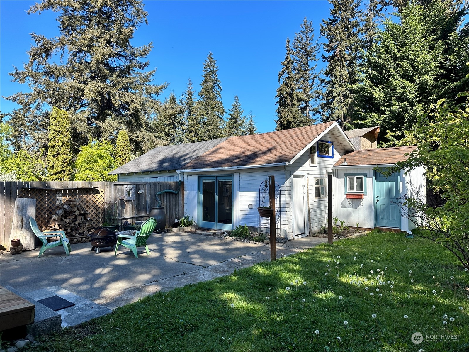 51 East Runnion Road Sequim, WA 98382 - Photo 35 of 40 a front view of a house with yard and green space