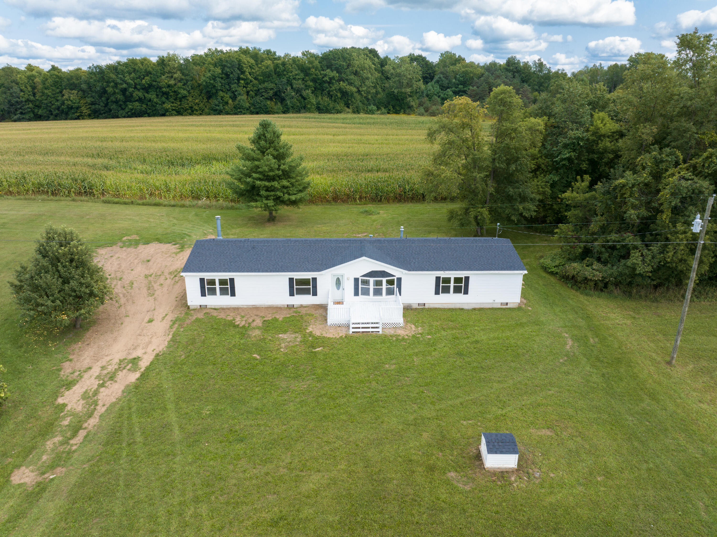 8699 South Coldwater Road Blanchard, MI 49310 - Photo 2 of 46 DJI_20230910084419_0333_D