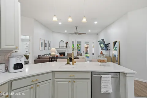a view of living room with furniture and flat screen tv