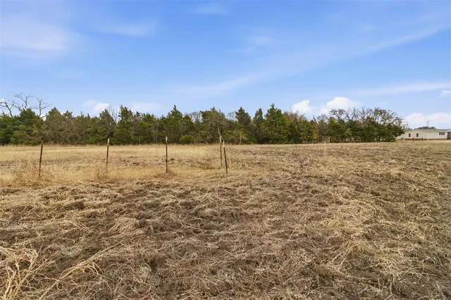 a view of lake with green space