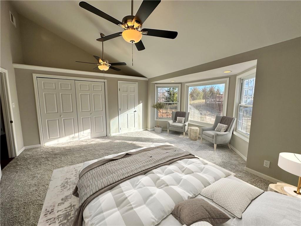 3095 Tuscarawas Road Beaver, PA 15009 - Photo 11 of 25 a spacious bedroom with a large bed a chandelier and large window