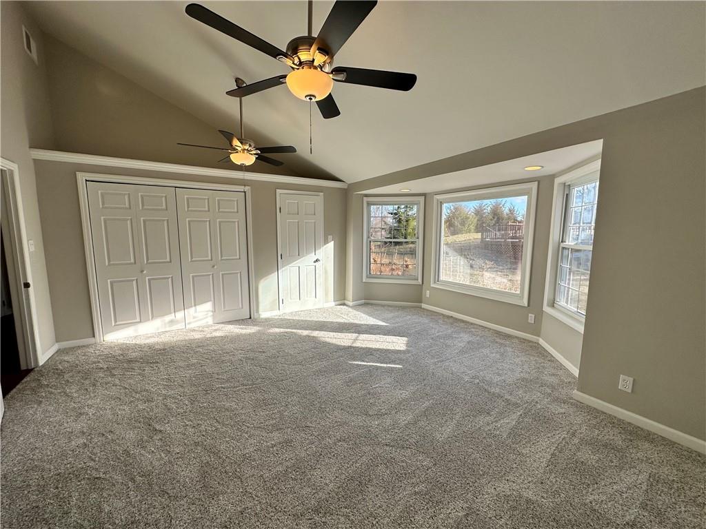 3095 Tuscarawas Road Beaver, PA 15009 - Photo 12 of 25 an empty room with windows and ceiling fan