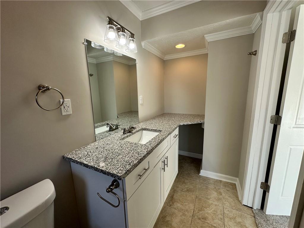 3095 Tuscarawas Road Beaver, PA 15009 - Photo 14 of 25 a bathroom with a granite countertop sink and a mirror