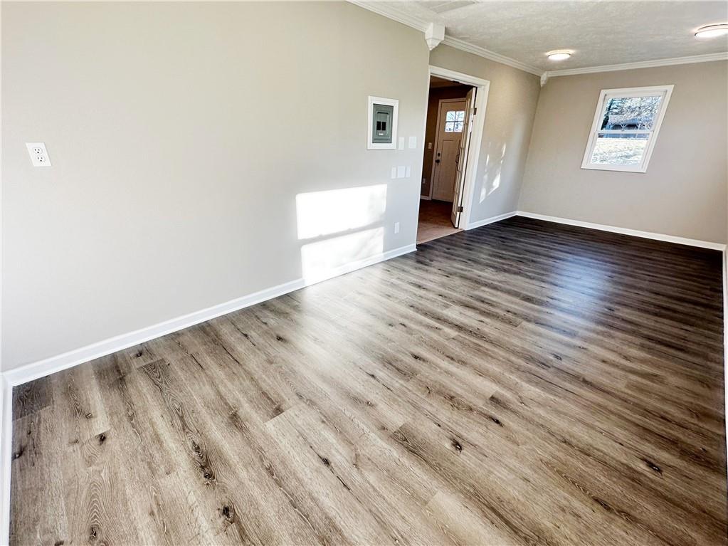3095 Tuscarawas Road Beaver, PA 15009 - Photo 21 of 25 an empty room with wooden floor and windows