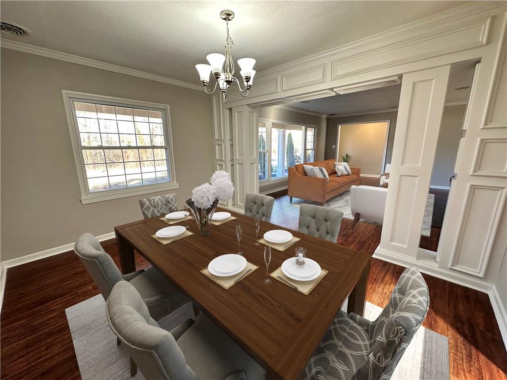 3095 Tuscarawas Road Beaver, PA 15009 - Photo 6 of 25 a view of a dining room with furniture a chandelier and wooden floor