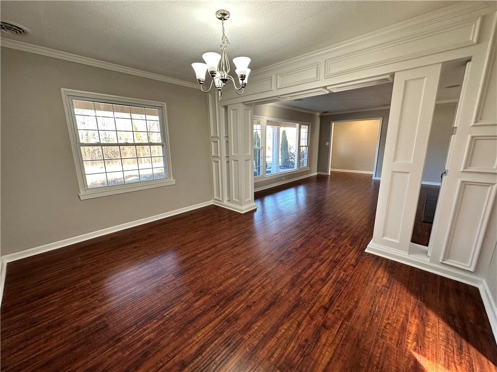 3095 Tuscarawas Road Beaver, PA 15009 - Photo 7 of 25 a view of an empty room with wooden floor and a window