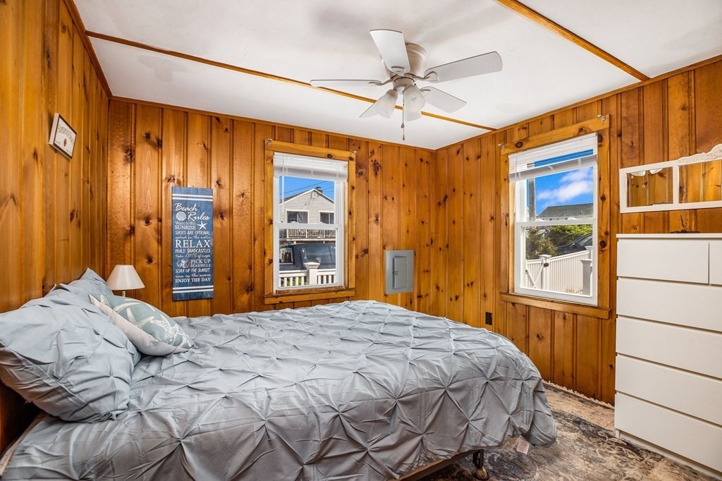 95 River Street Scituate, MA 02066 - Photo 11 of 23 a bedroom with a large bed and a window