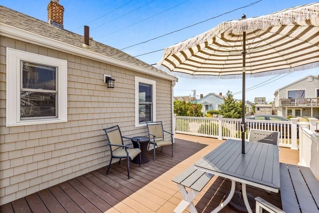 95 River Street Scituate, MA 02066 - Photo 15 of 23 a view of a balcony with dining table and chairs