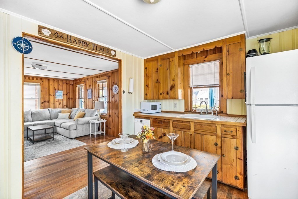 95 River Street Scituate, MA 02066 - Photo 7 of 23 a dining room with furniture and a window