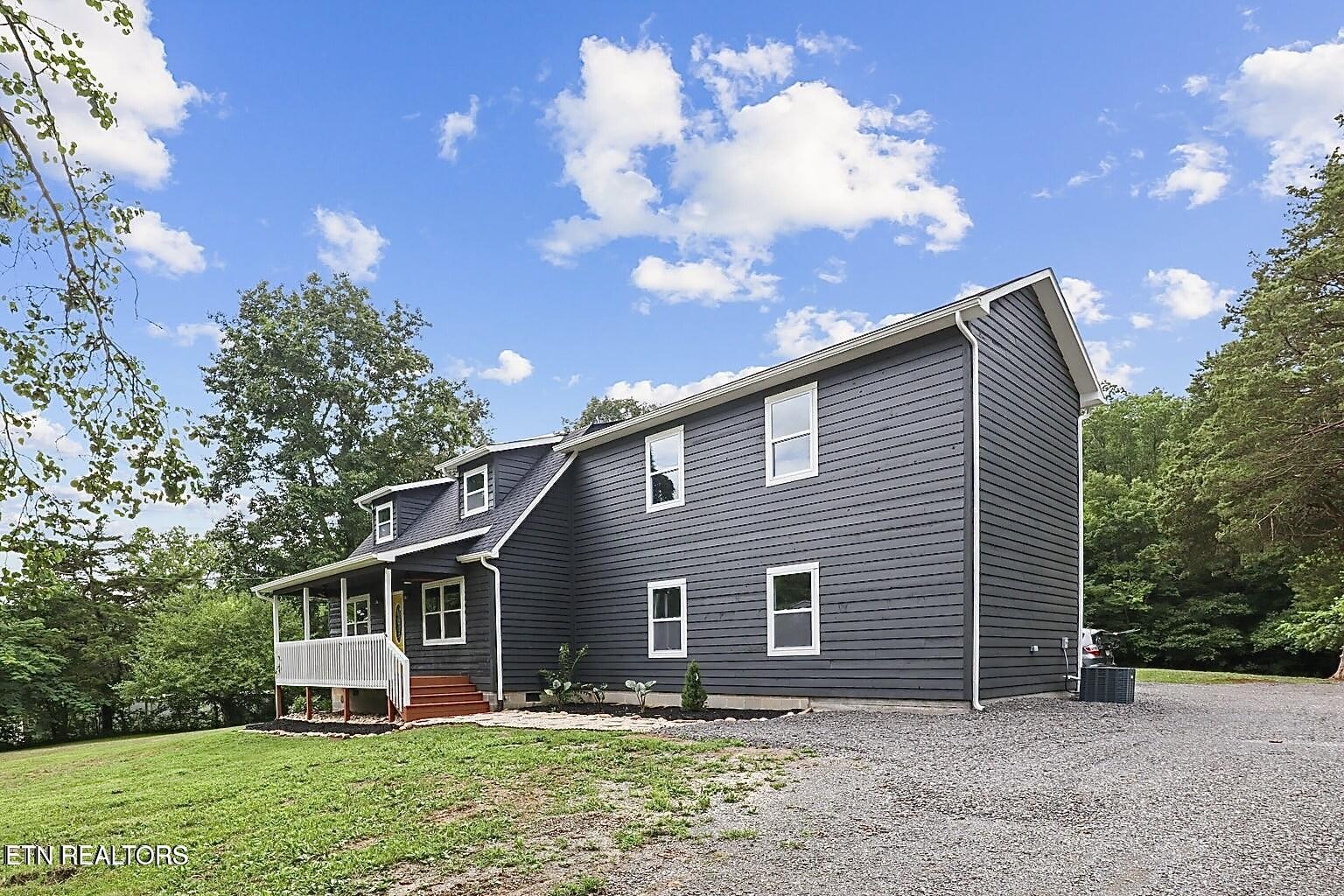 589 Possum Valley Road Maynardville, TN 37807 - Photo 1 of 49 a front view of house with yard and green space