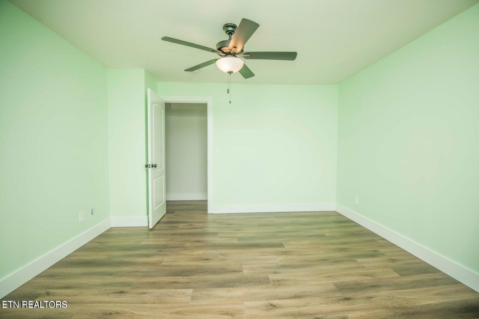 589 Possum Valley Road Maynardville, TN 37807 - Photo 36 of 49 a view of an empty room with wooden floor