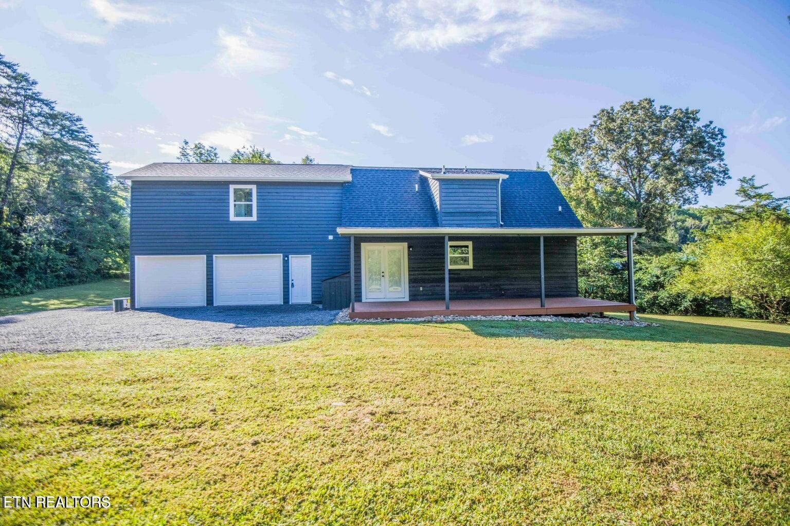 589 Possum Valley Road Maynardville, TN 37807 - Photo 43 of 49 a view of a house with swimming pool and a yard