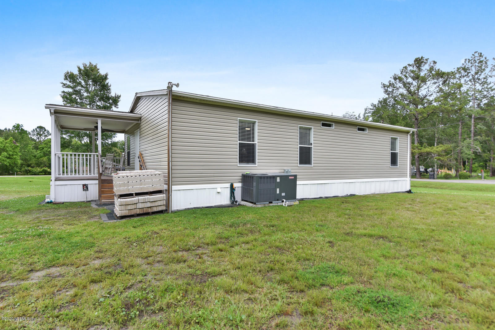 54464 Sherwood Road Callahan, FL 32011 - Photo 25 of 25 a view of a house with a backyard