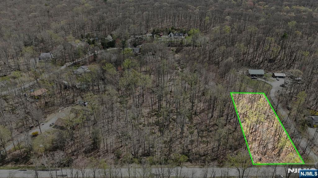 13 Oak Ridge Road Montague, NJ 07827 - Photo 14 of 25 a view of a yard with a trees