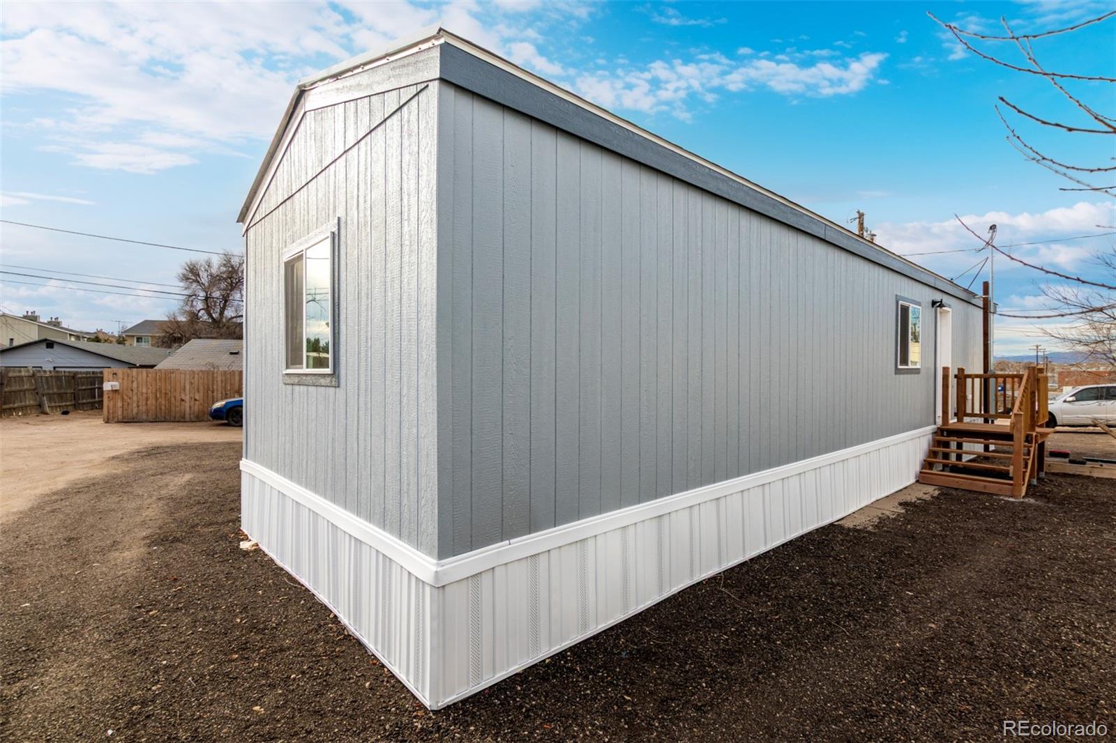 105 Longs Street Brighton, CO 80601 - Photo 25 of 27 a view of a porch