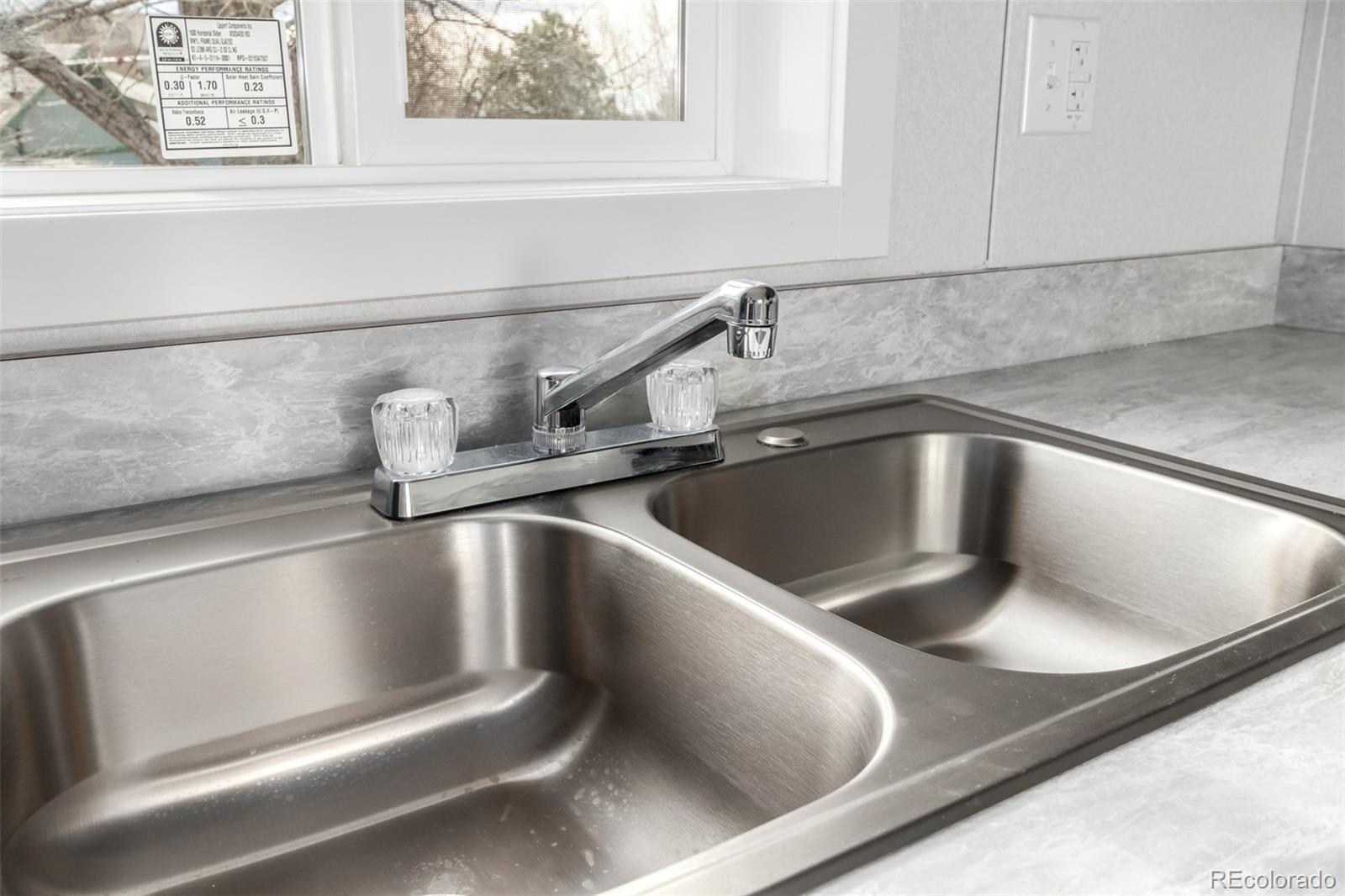 105 Longs Street Brighton, CO 80601 - Photo 5 of 27 a close view of sink