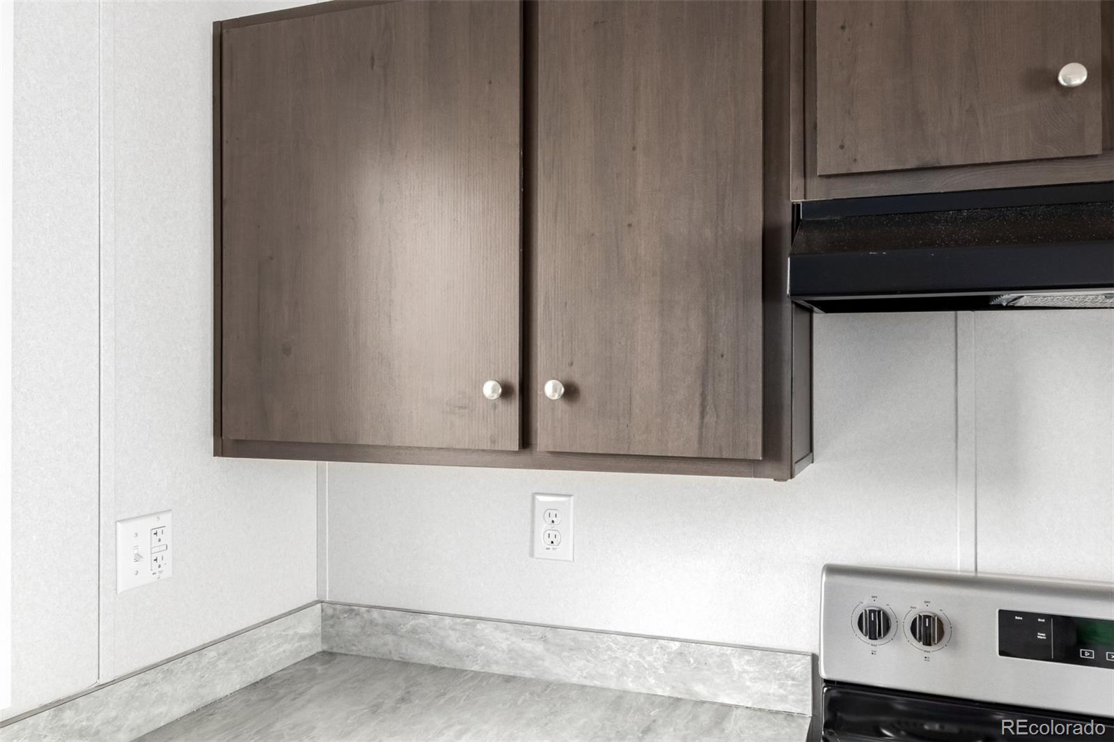 105 Longs Street Brighton, CO 80601 - Photo 6 of 27 a view of a microwave