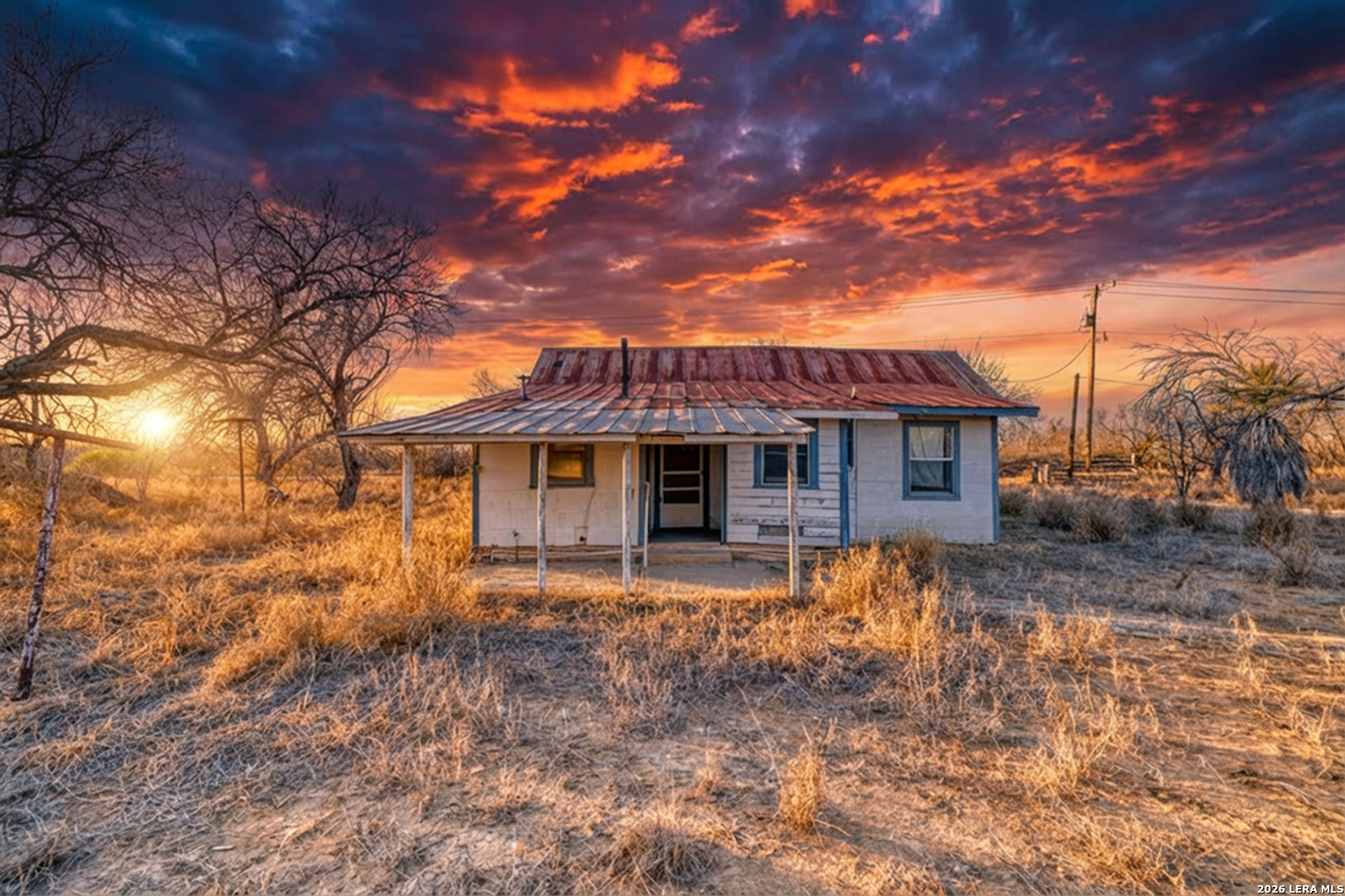 214 Cox Lane Road Carrizo Springs, TX 78834 - Photo 2 of 31 a front view of a house with a yard