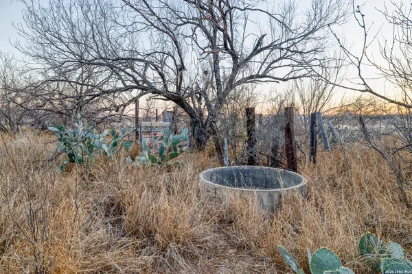a view of a yard and mountain view