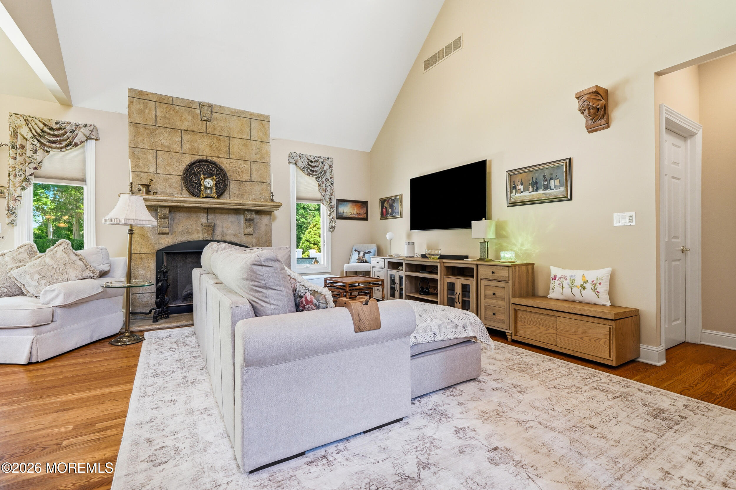 478 Rickey Lane Long Branch, NJ 07740 - Photo 23 of 64 a living room with furniture and a flat screen tv