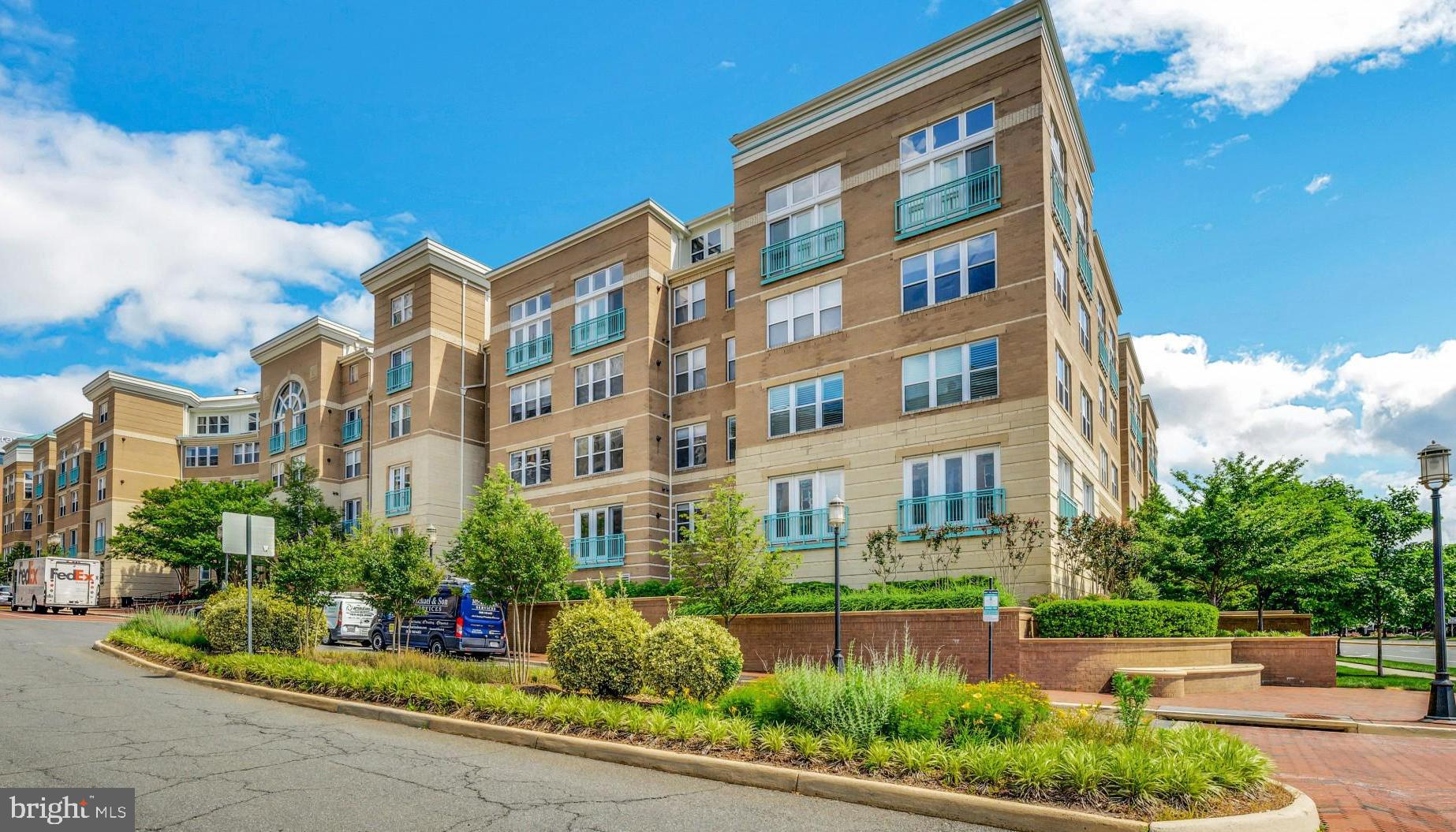 12001 Market Street, Unit 106 Reston, VA 20190 - Photo 1 of 26 a front view of a building