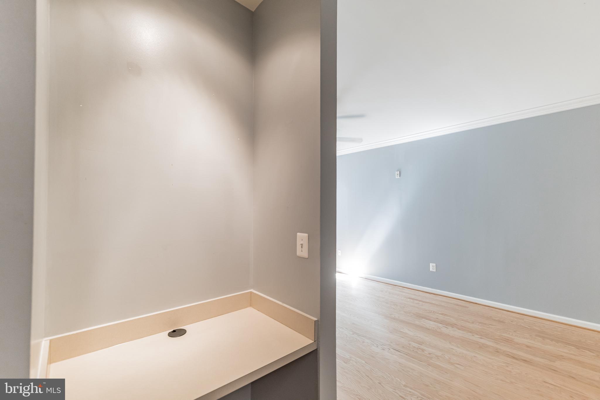 12001 Market Street, Unit 106 Reston, VA 20190 - Photo 19 of 26 a view of an empty room