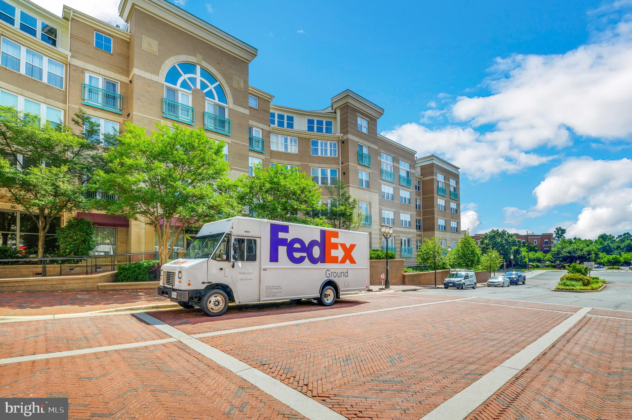 12001 Market Street, Unit 106 Reston, VA 20190 - Photo 26 of 26 a car parked on the side of a street