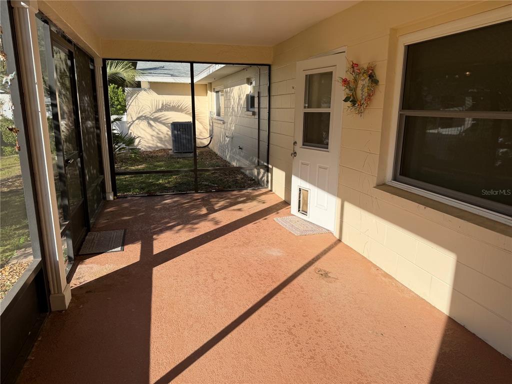 9529 Southwest 85th Avenue, Unit D Ocala, FL 34481 - Photo 20 of 21 a view of a porch