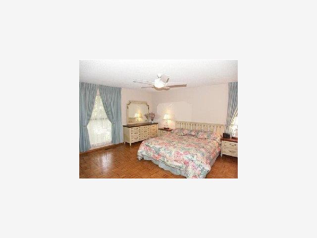 280 Robin Road Hillsborough, CA 94010 - Photo 6 of 8 a living room with a couch and a coffee table