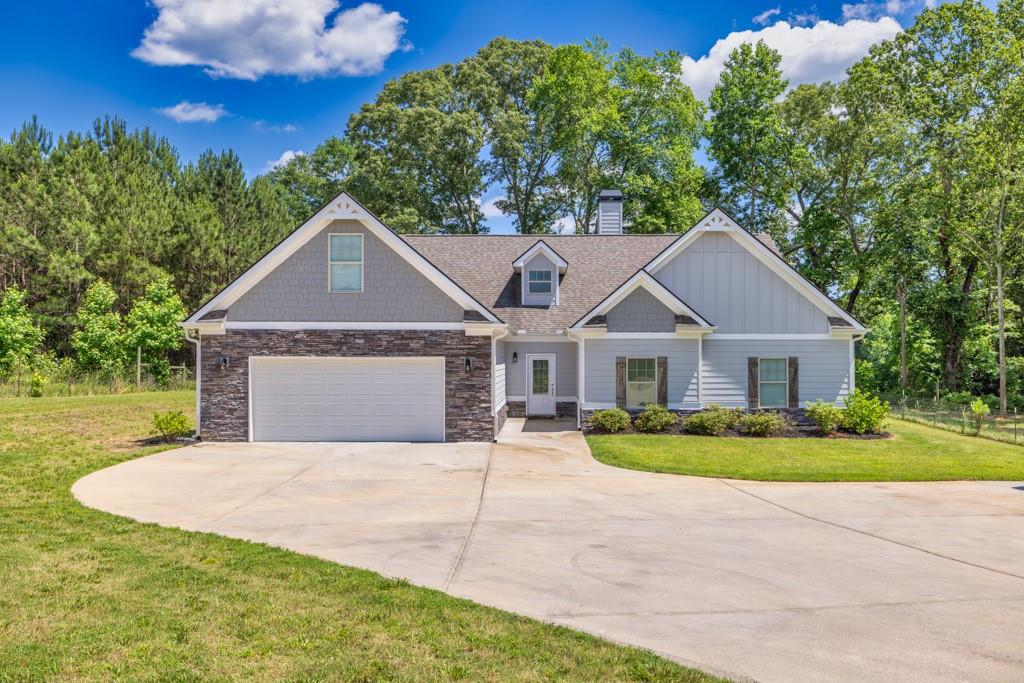 2800 Nebo Road Douglasville, GA 30134 - Photo 1 of 1 a front view of a house with a yard and garage