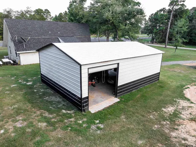 a view of a backyard with a garden