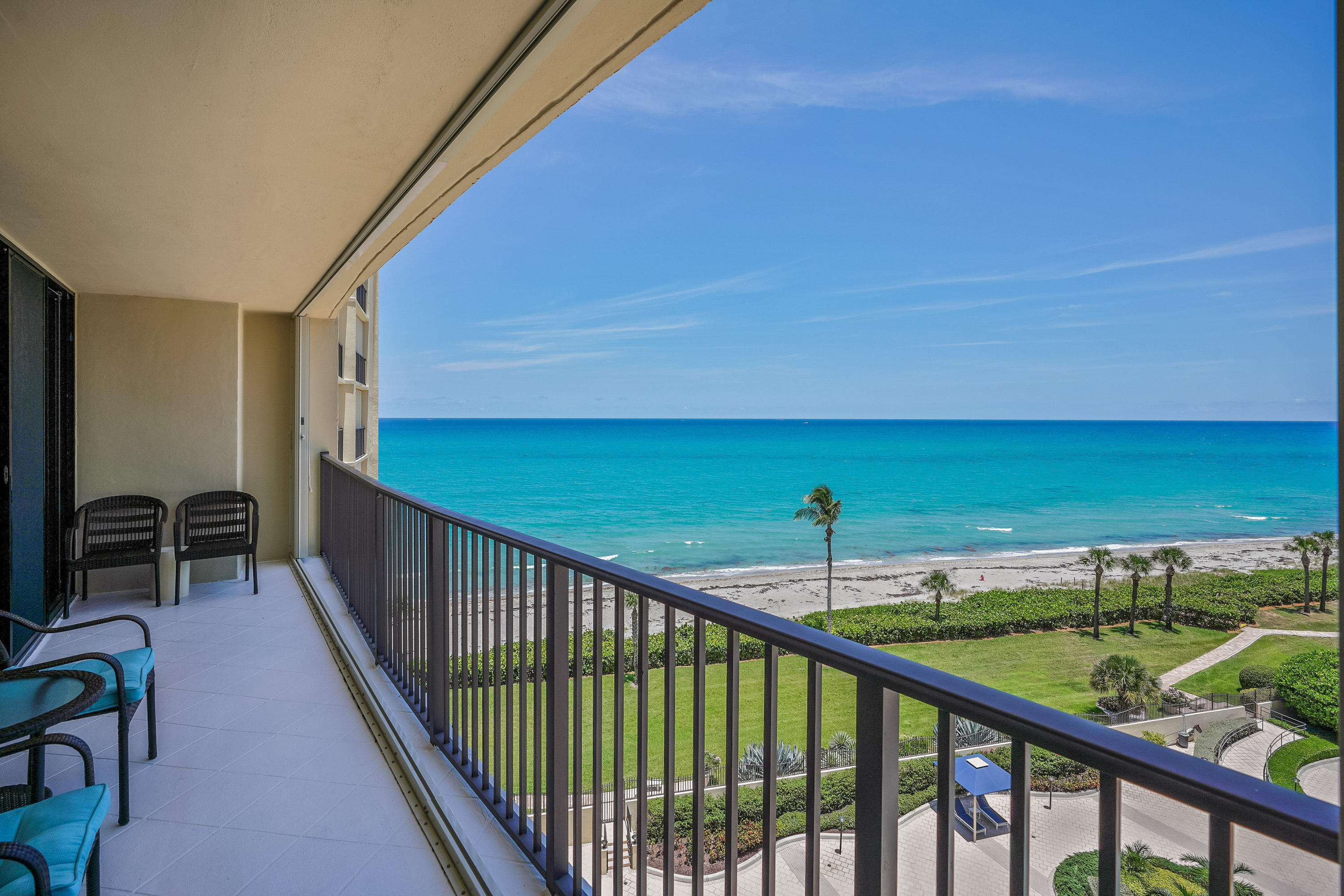 a balcony with an ocean view