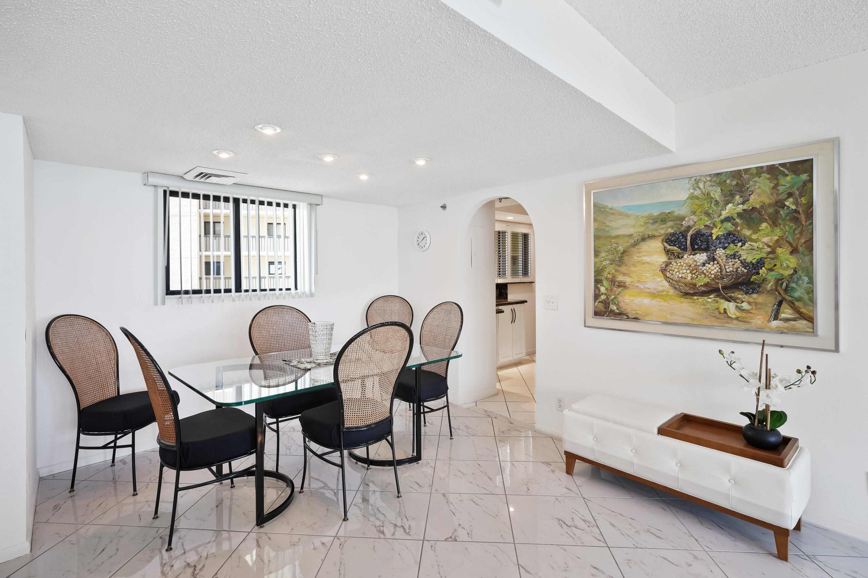 200 Ocean Trail Way, Unit 708 Jupiter, FL 33477 - Photo 12 of 23 a view of a dining room with furniture and window