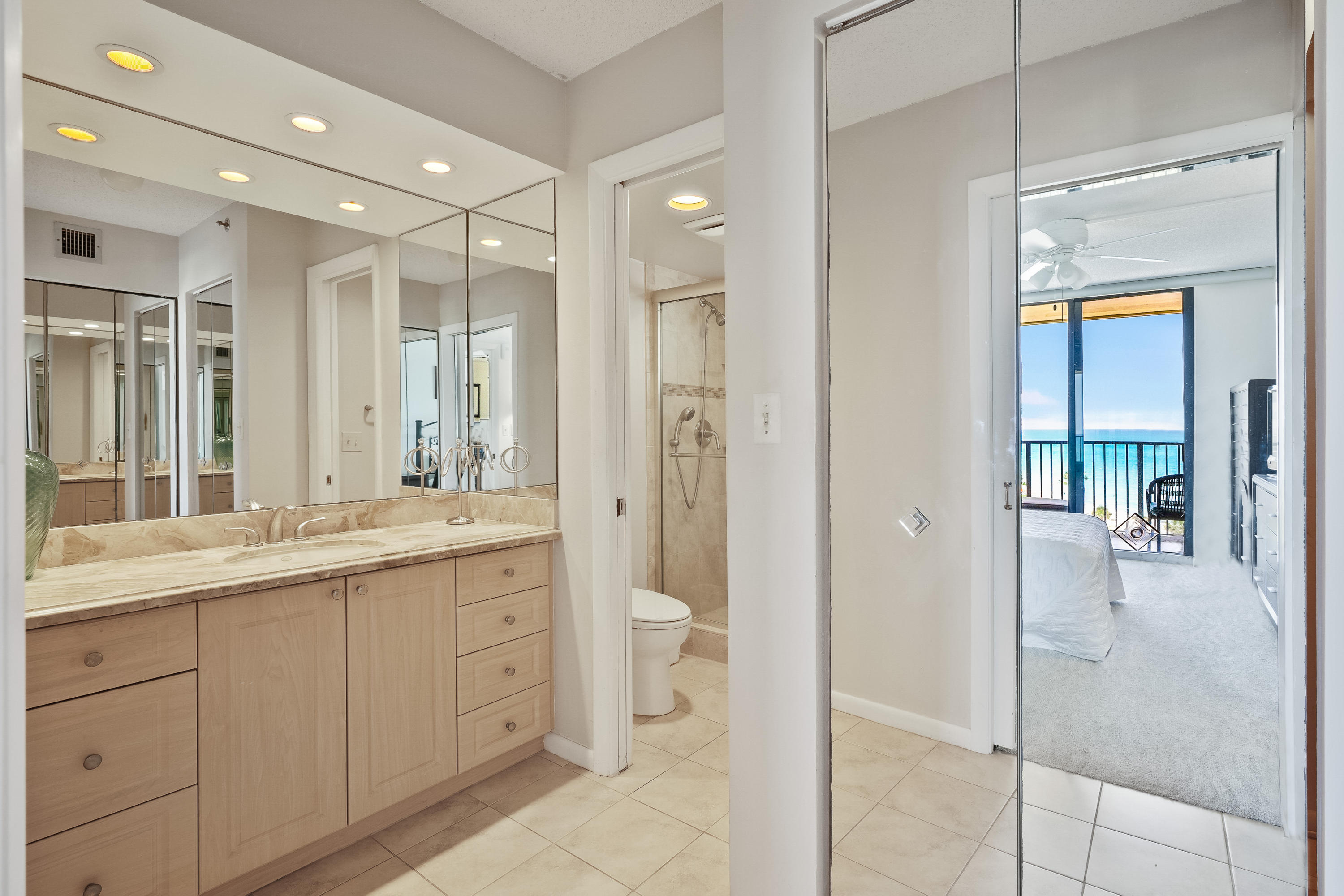 200 Ocean Trail Way, Unit 708 Jupiter, FL 33477 - Photo 16 of 23 a bathroom with a granite countertop sink mirror and double