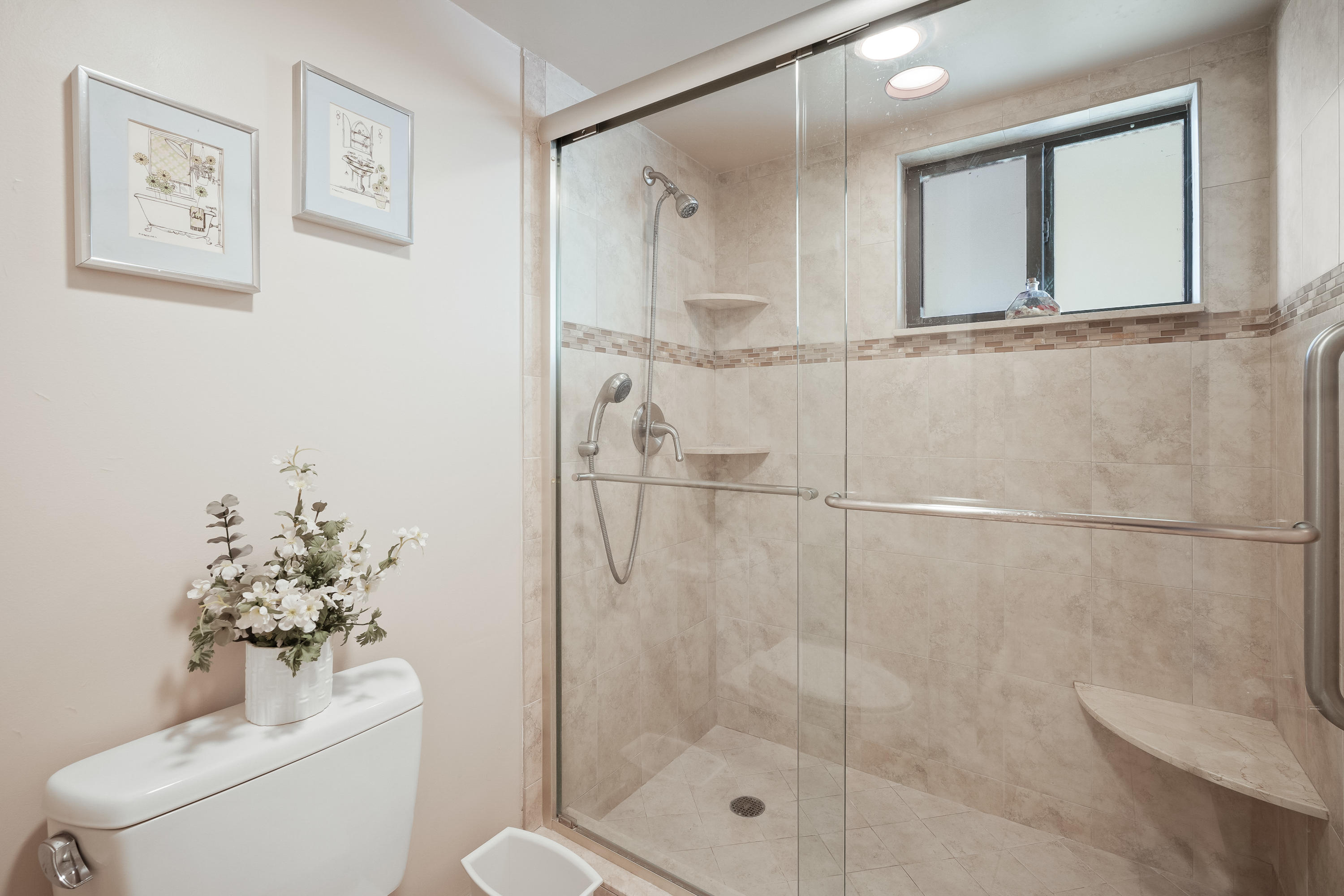 200 Ocean Trail Way, Unit 708 Jupiter, FL 33477 - Photo 17 of 23 a bathroom with a shower